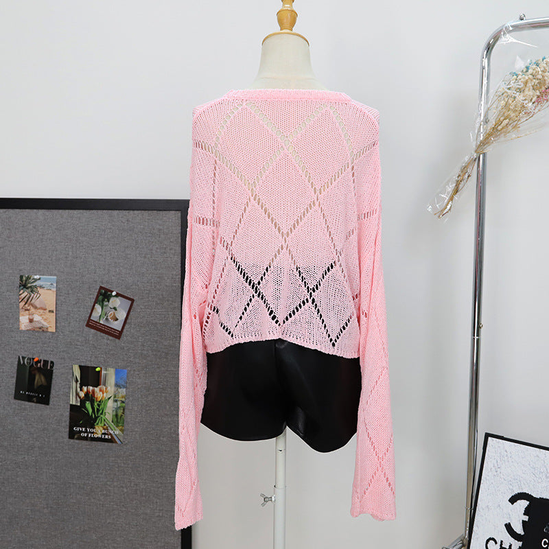 Hollow out loose fitting pullover long sleeved sweater